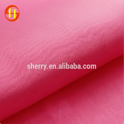 Dress textile fabric stocklot sparkle cheap organza fabric