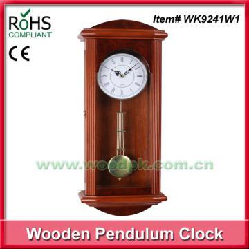 Antique wooden wall pendulum clock for sale