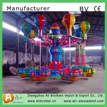 Fair ground kiddy rides electrical samba balloons for amusement