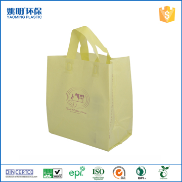 Light yellow handle plastic bag stand up shopping bag