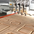 Máquina de tallado de cabezales de múltiples máquinas de trabajo CNC Router