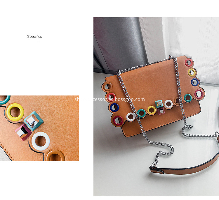 handbag with colored eyelets embellishments