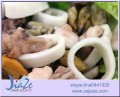 skaldjursblandning bläckfisk ring musslor kött