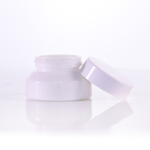 White cream jar with white plastic cap