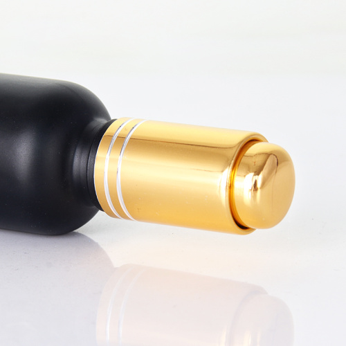 Black Round Serum Bottle Golden Trigger Screw Cap Black Cosmetic Serum Bottles with Dropper Supplier