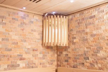 Luxury Indoor Sauna with Star Lights, Cultured Stone, and Harvia Stove