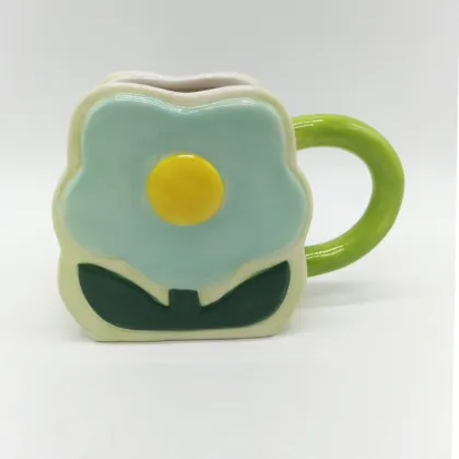 Green Daisy Relief Ceramic Mug