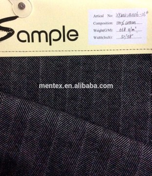 heavyweight wax-coated cotton via herringbone pattern