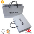 bolsa de papel kraft blanco con logo negro