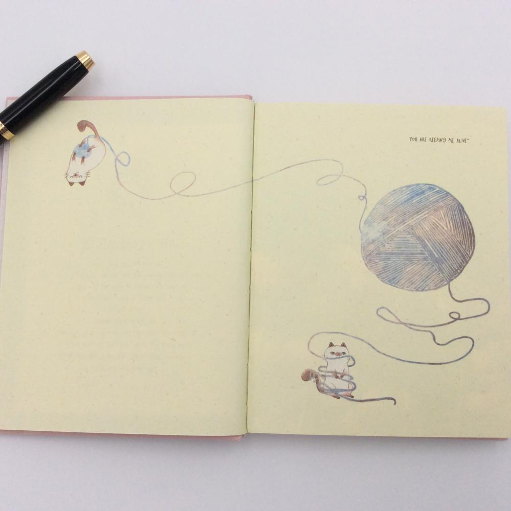 Paper cartoon notebook with colored pages