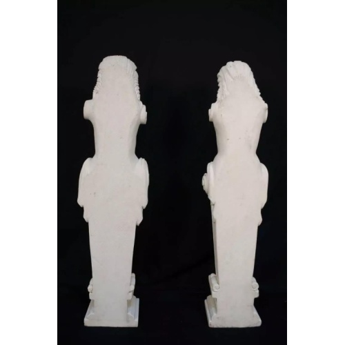 Classic Marble Statues Featuring Female Figures and Flowers