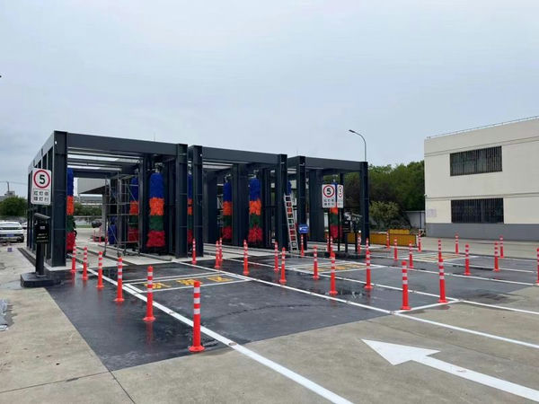 Système de lavage de voitures de bus