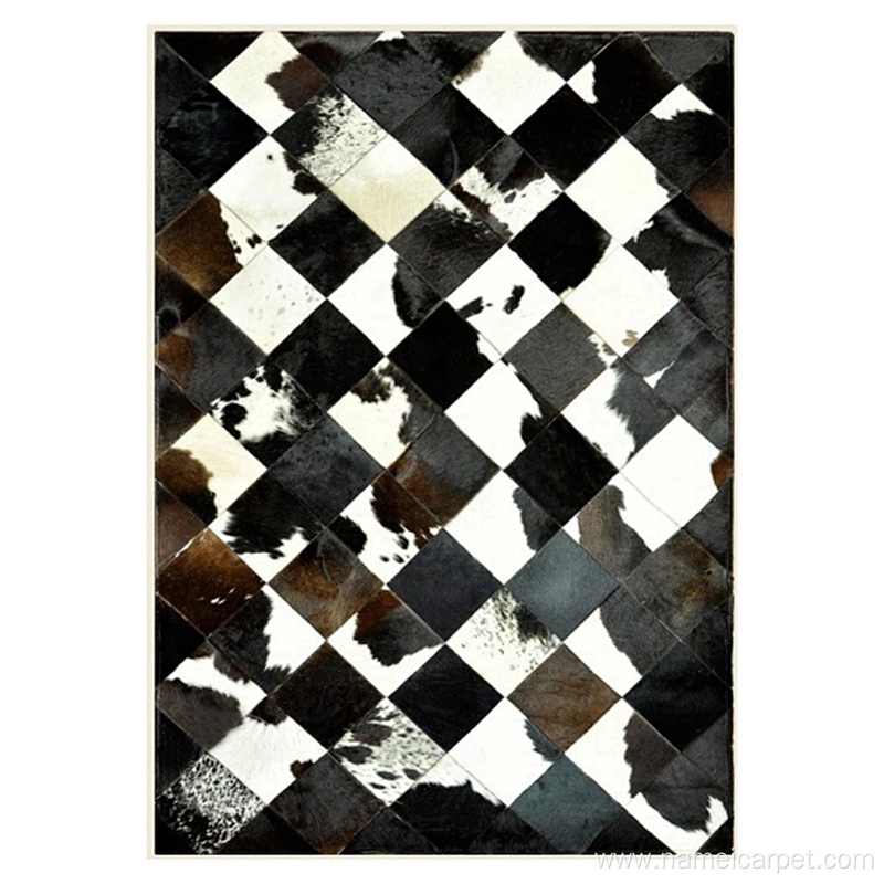 Cowhide black and white leather center area rug