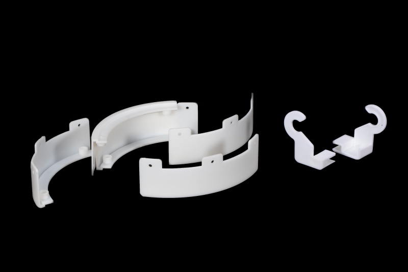 Plastic curved injection molded parts