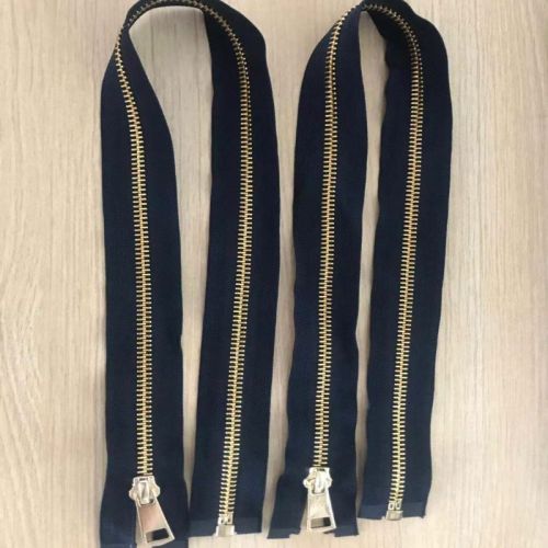 Continuous unique golden metal zippers for coat