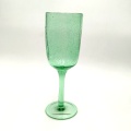 green glass carafe champagne coupe flute with bubble