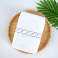 set asciugamani in cotone ricamato tinta unita grammo