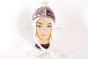 knitted hats with earflap and the pom pom
