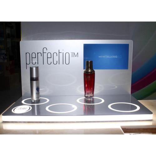 Small clear acrylic display stand for cosmetics