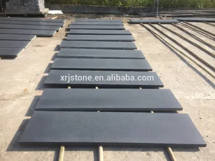 artificial black basalt stone flooring outside stone floor