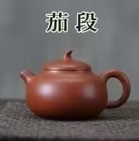 A purple clay teapot with a section of the cactus