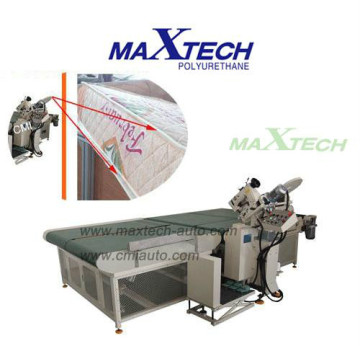 Auto mattress tape edge machine