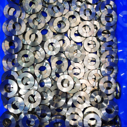Titanium alloy nut gasket