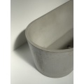 Moderne matte ovale Betonbadewanne