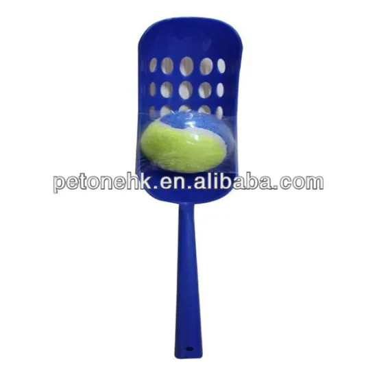 Playing dog tennis ball thrower