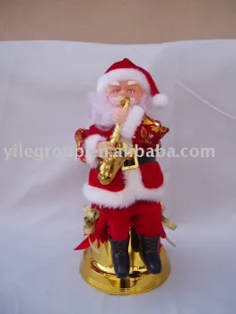 12"santa sitting  on ring playing saxophone