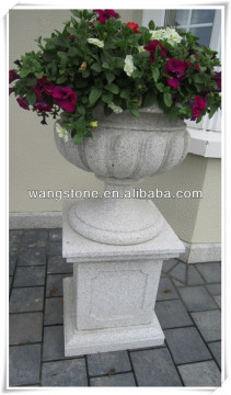 White natural stone planter for garden decor