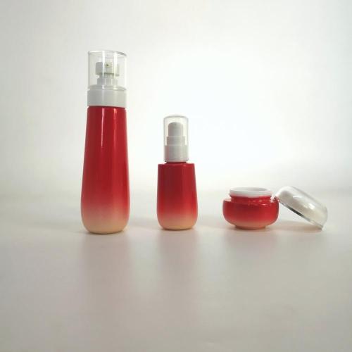 Conjunto de frasco de vidro cosmético gradiente vermelho