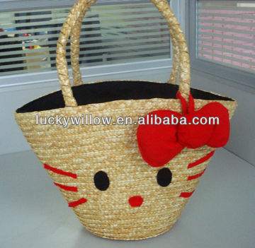 Beautiful straw handbag with Hello kitty pattern and red bowknot