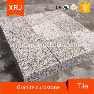 Paving stones with granite curbstone curbstone