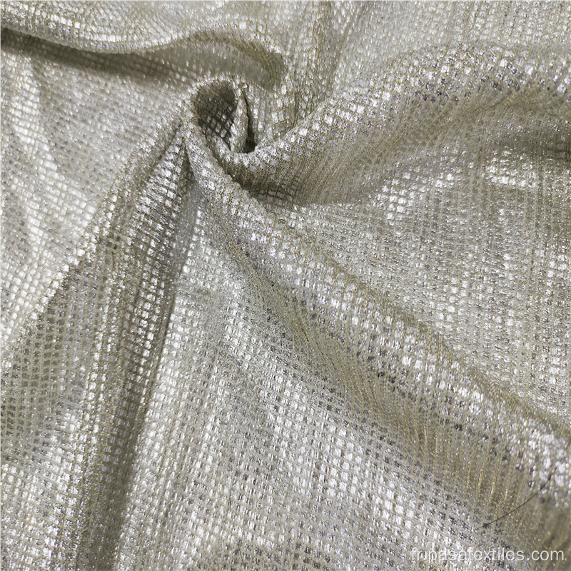 Tissu bronzant dentelle tulle pailleté