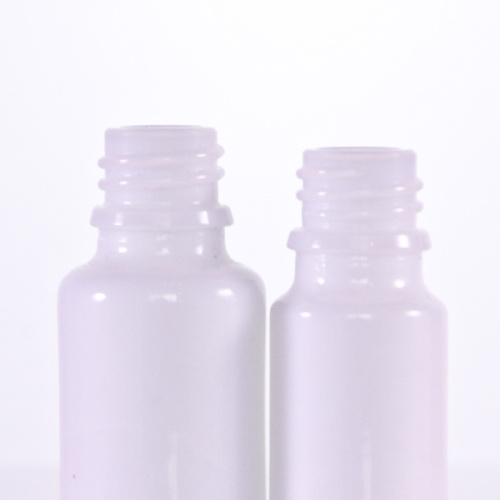 Botellas de bomba de vidrio blanco opal con cubierta transparente