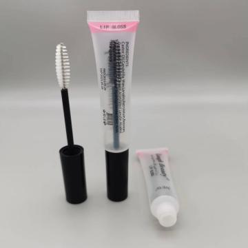 Kosongkan pembungkusan tiub lipgloss kosong dengan berus