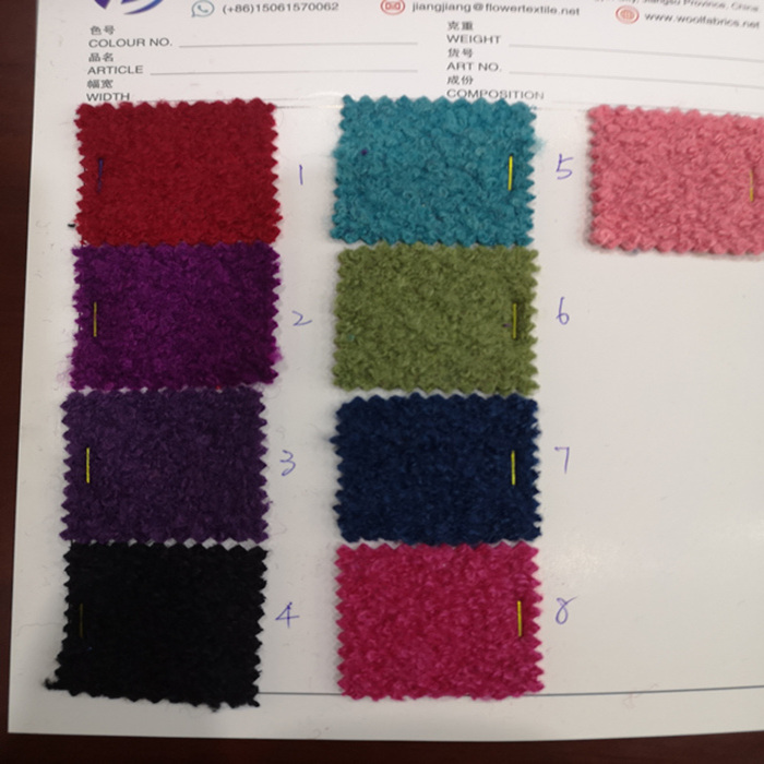 Knitted wool viscose polyester blend boucle fabric