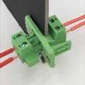 with flange plug through wall panel terminal block