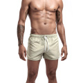 Shorts de praia masculinos por atacado que executam shorts esportivos