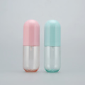 Huisdier plastic macaron kleur pil capsule vormig roze blauw cosmetisch logo mist spuit flessen 50 ml 30 ml