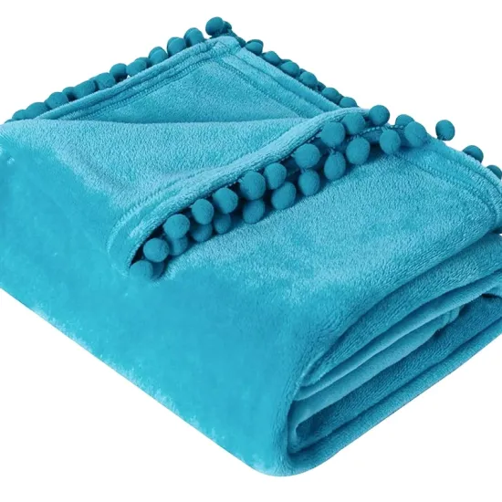 Amazon hot sell quality solid color flannel fleece blanket with pompom edge