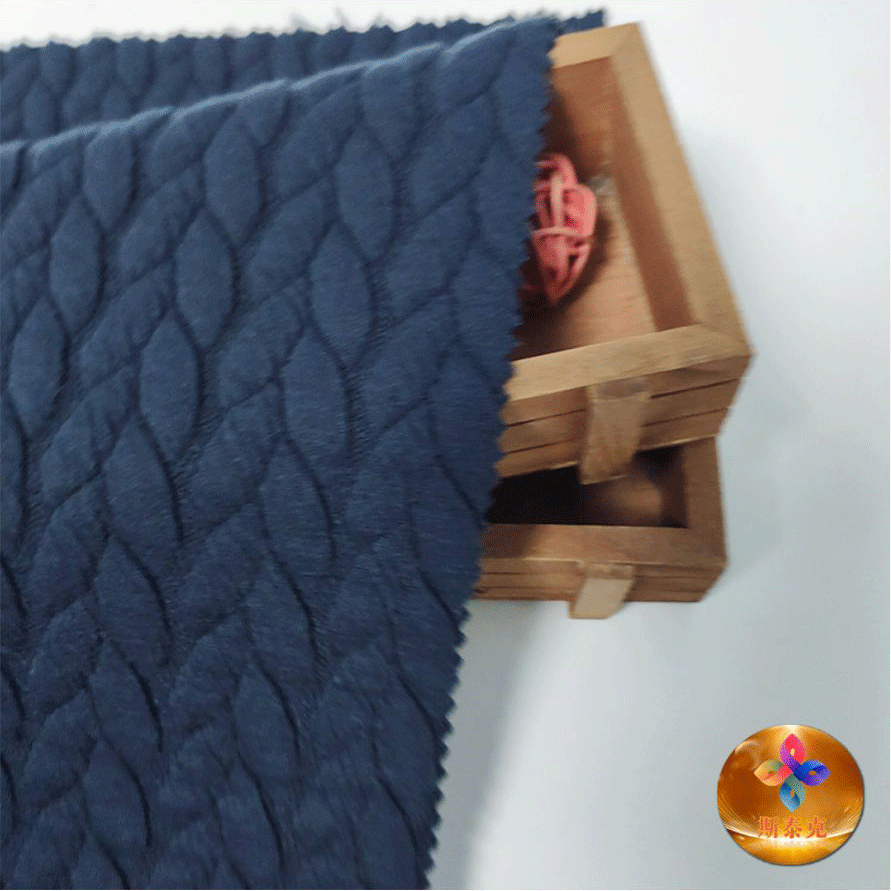 豊かなテクスチャーのエレガントなジャクアードスキューバ生地