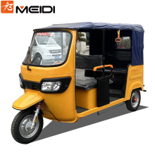 Electric three wheeled passenger vehicle