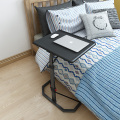Movable over bed table