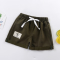 Pantalones cortos de deportes de algodón pantalones para niños