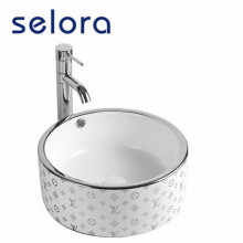 Lavabo bañado en plata de cerámica de baño de diseño moderno