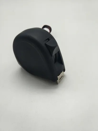 Black plastic case with pull tape measure