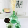 Jarrones de vidrio de flor verde reciclado al por mayor