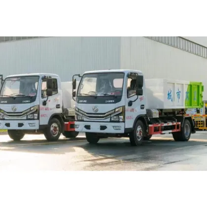 Multi-purpose hook arm garbage truck